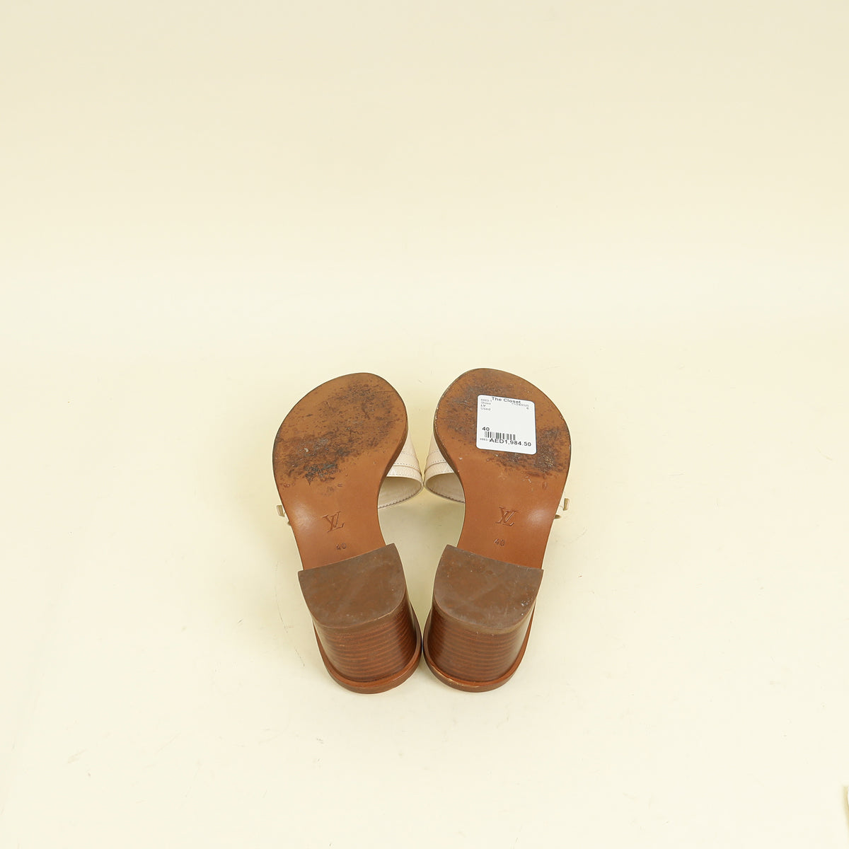 Louis Vuitton Cream Monogram Empreinte Lockit Mules 40