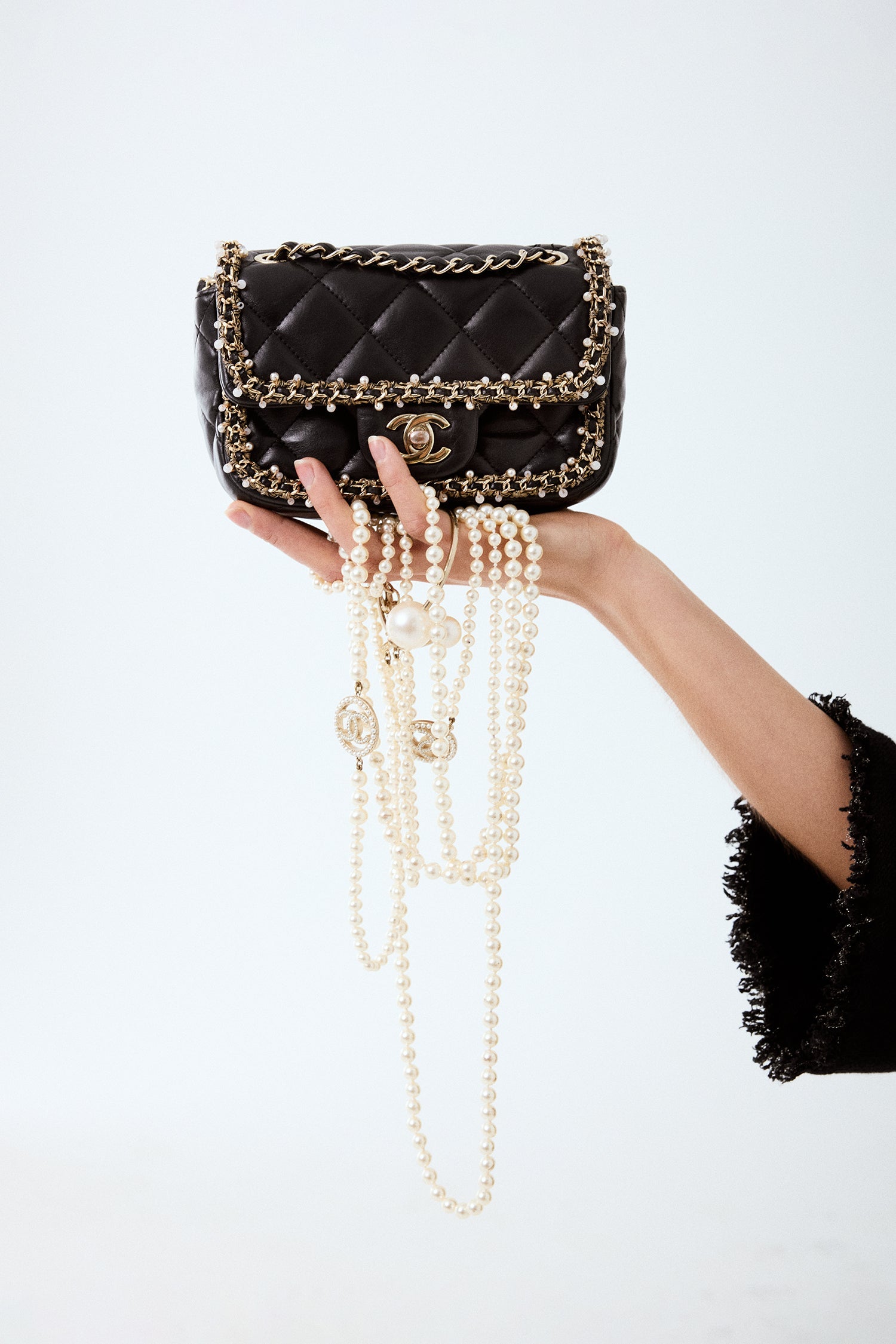 Chanel™ Black Lambskin Pearl Chain Around Square Flap Bag