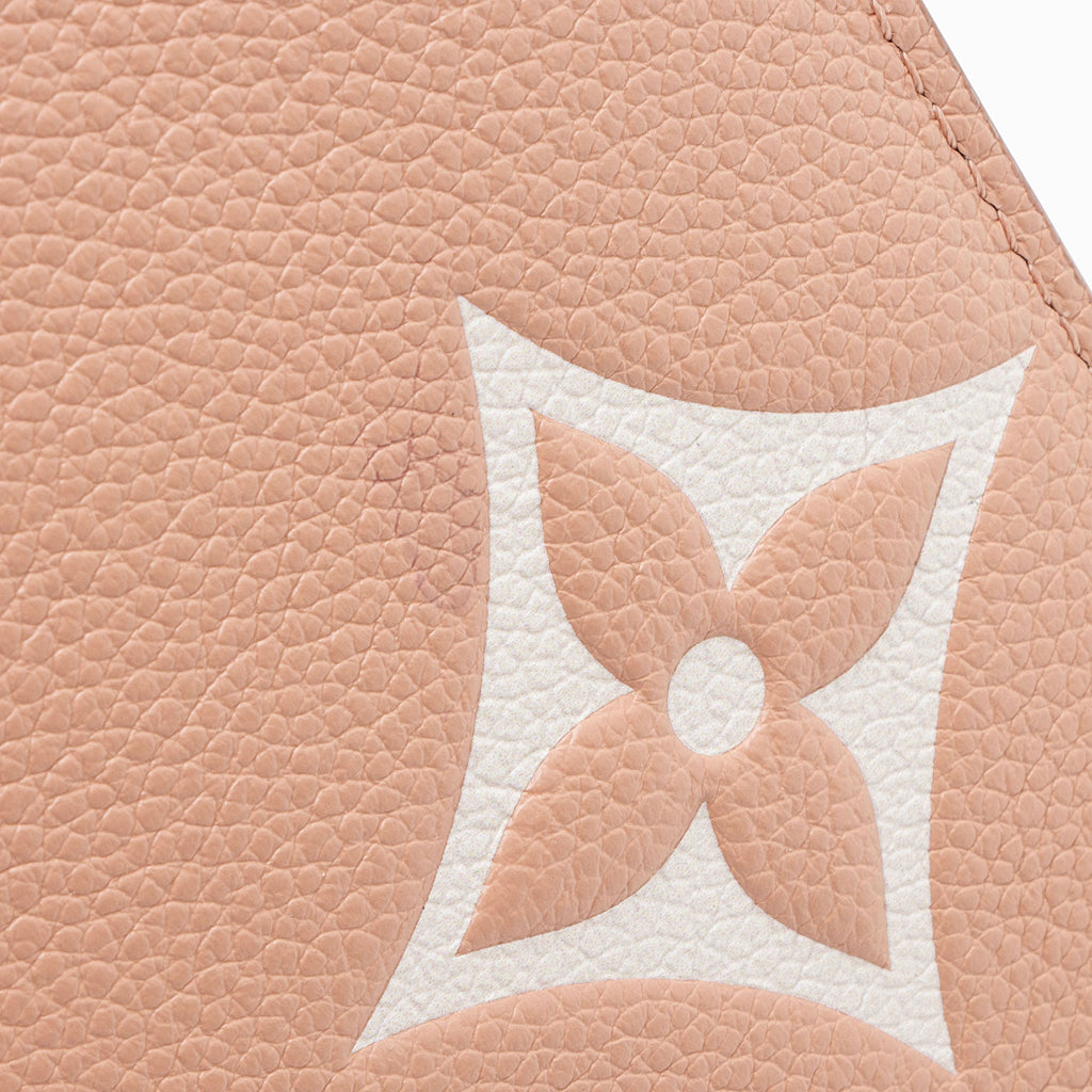 Louis Vuiiton Giant Monogram Empreinte Bicolor Neverfull MM Pochette