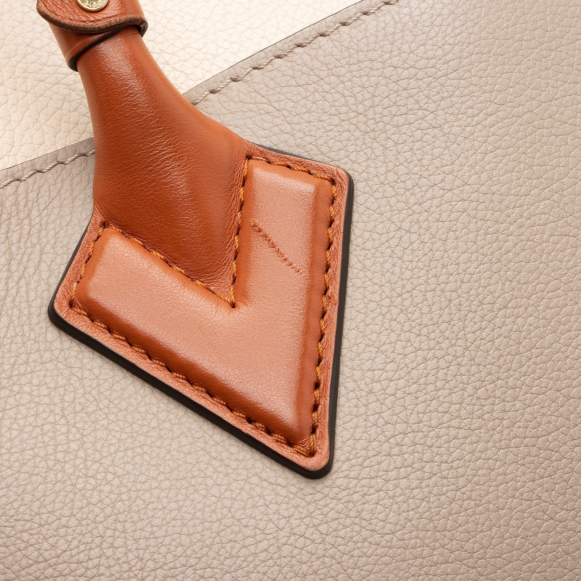 Louis Vuitton Calfskin Tufted Monogram On My Side MM Tote