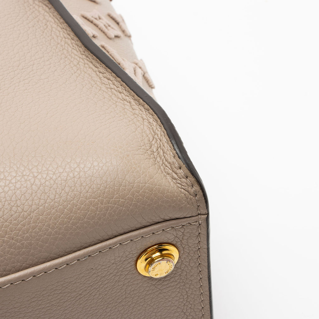Louis Vuitton Calfskin Tufted Monogram On My Side MM Tote