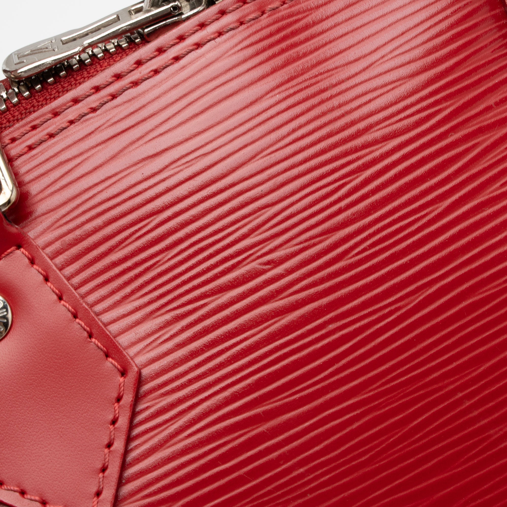 Louis Vuitton Epi Leather Alma PM Satchel (SHF-WDQc4X)