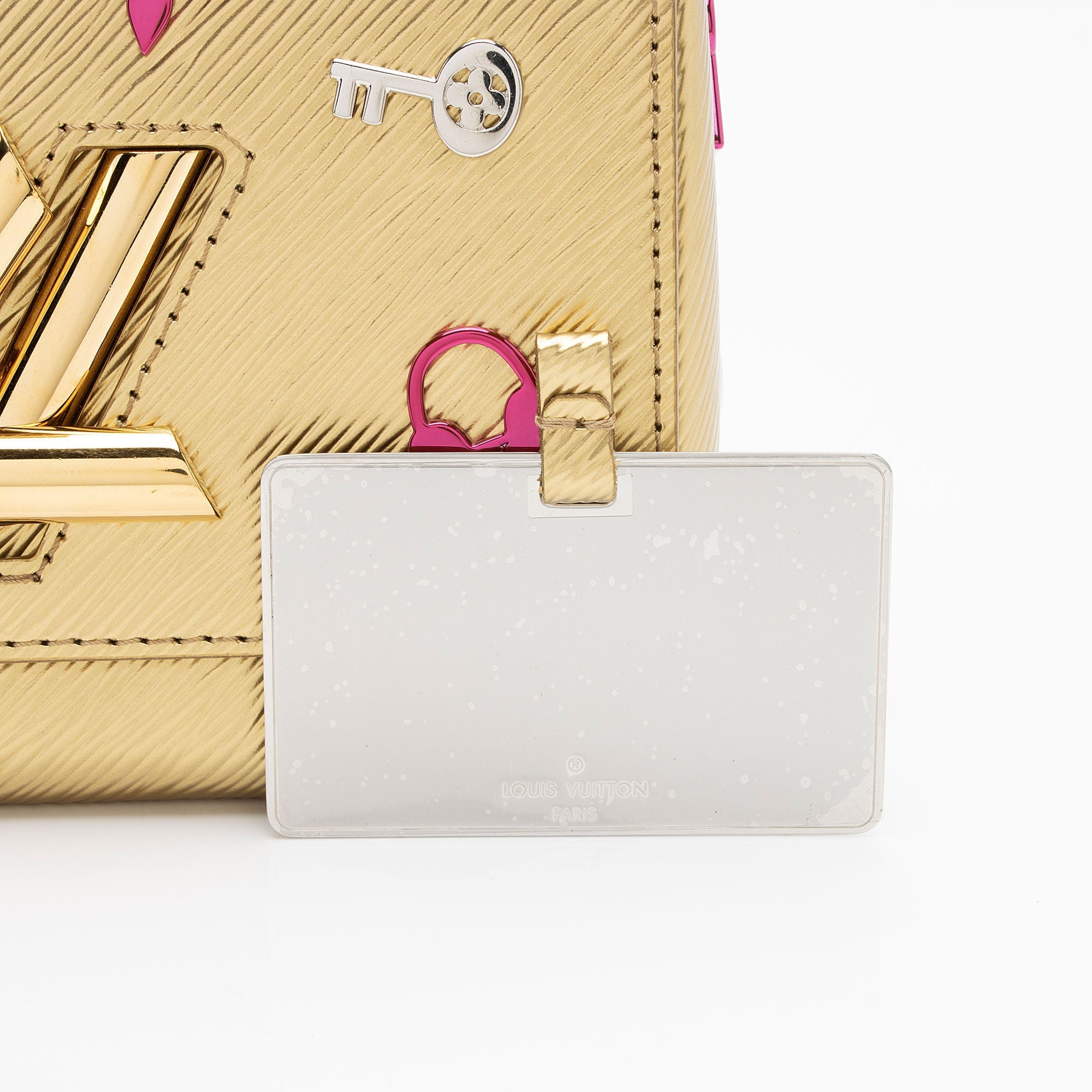 Louis Vuitton Epi Leather Love Lock Twist MM Shoulder Bag (SHF-ouz3vc)