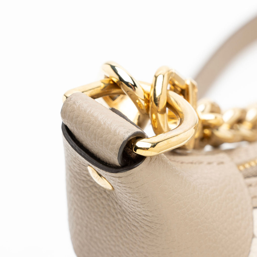Louis Vuitton Giant Monogram Empreinte Bicolor Loop Hobo