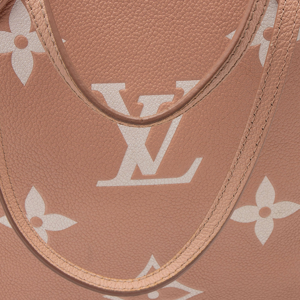 Louis Vuitton Giant Monogram Empreinte Bicolor Neverfull MM Tote