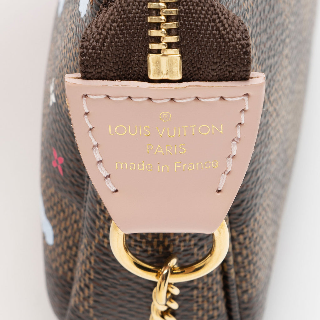 Louis Vuitton Limited Edition Damier Ebene Big Wheel Mini Pochette Accessoires (SHF-5CtGIM)