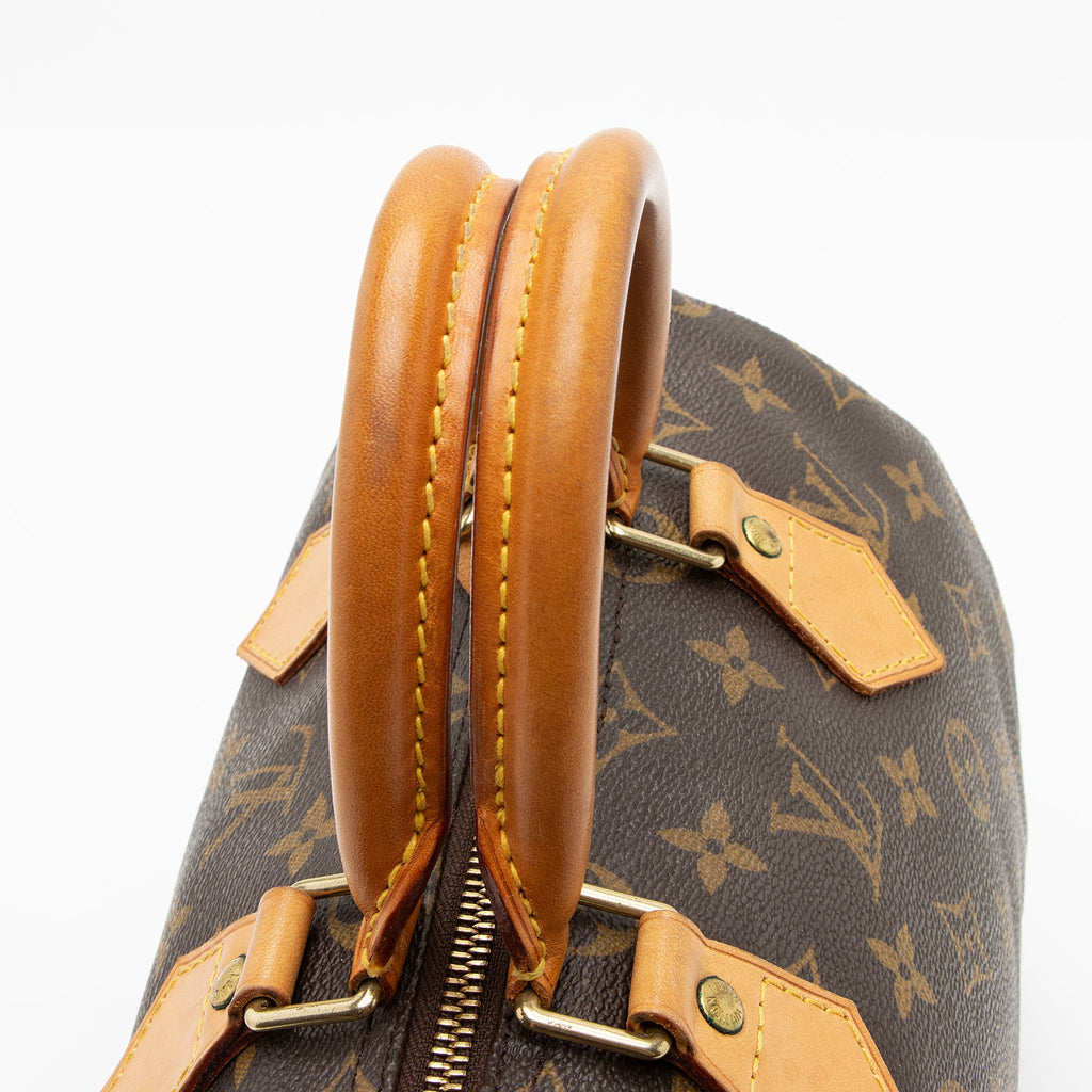 Louis Vuitton Monogram Canvas Speedy 25 Satchel (SHF-1NUxF3)