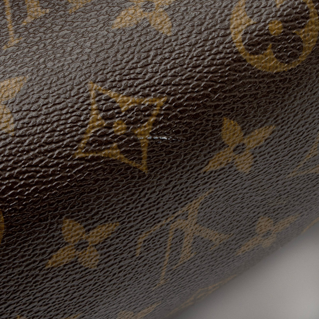 Louis Vuitton Monogram Canvas Tivoli GM Satchel (SHF-dqoQwG)