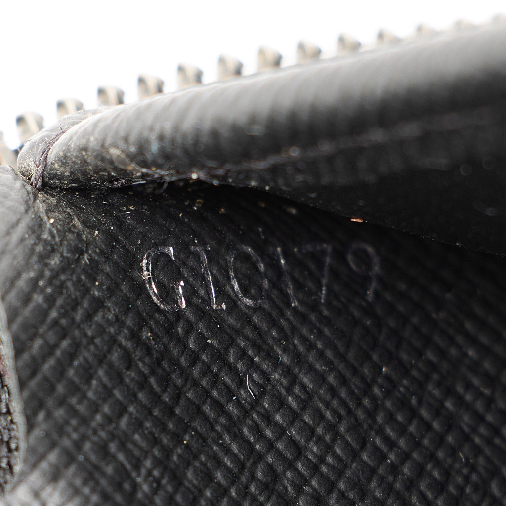 Louis Vuitton Monogram Eclipse Vertical Zippy Wallet