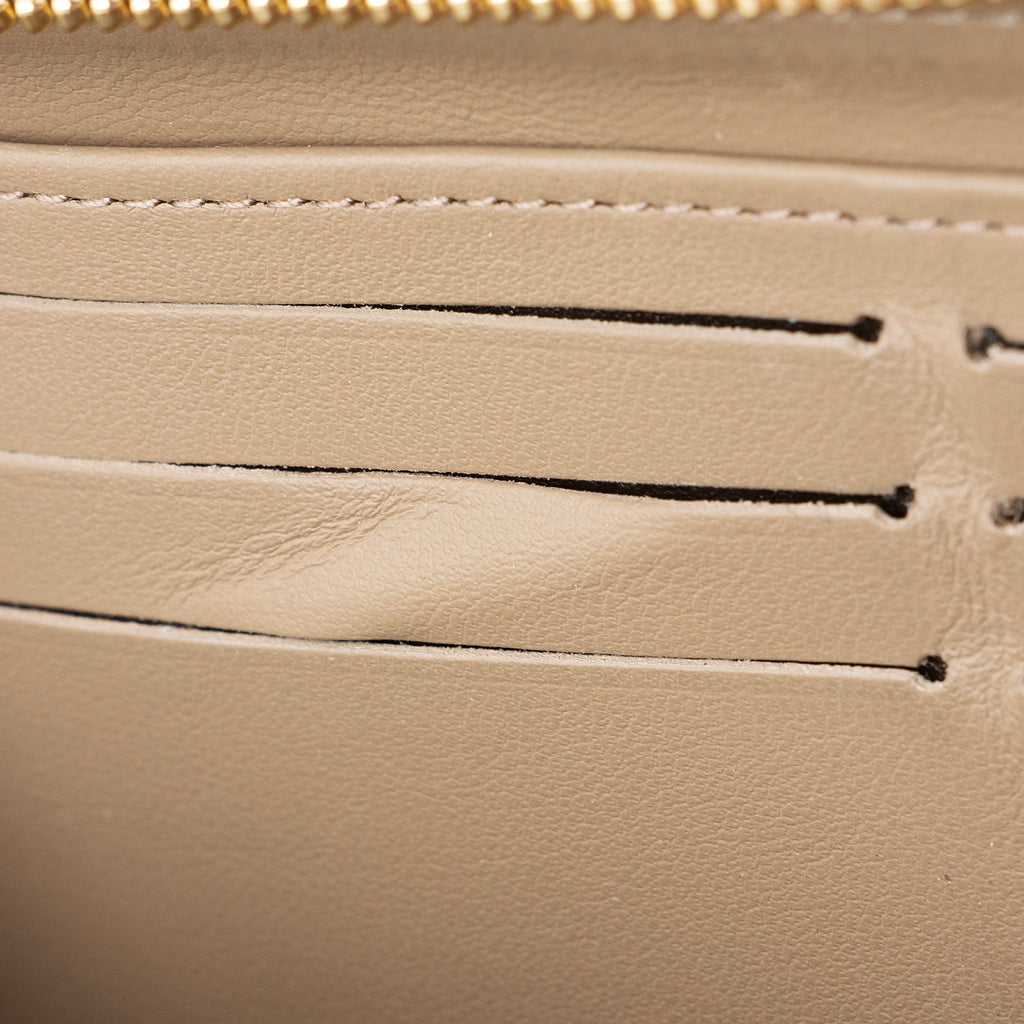 Louis Vuitton Monogram Embossed Lambskin Coussin Zippy Wallet