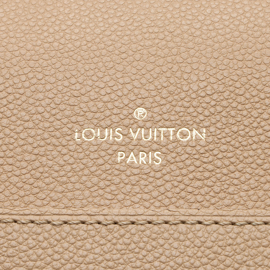 Louis Vuitton Monogram Empreinte Trocadero Satchel (SHF-r0AT3n)