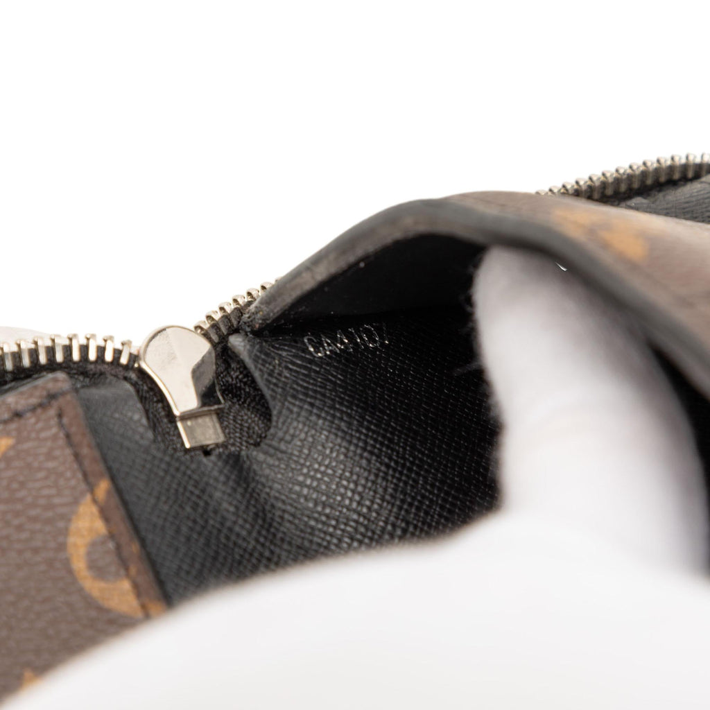 Louis Vuitton Monogram Macassar Vertical Zippy Wallet