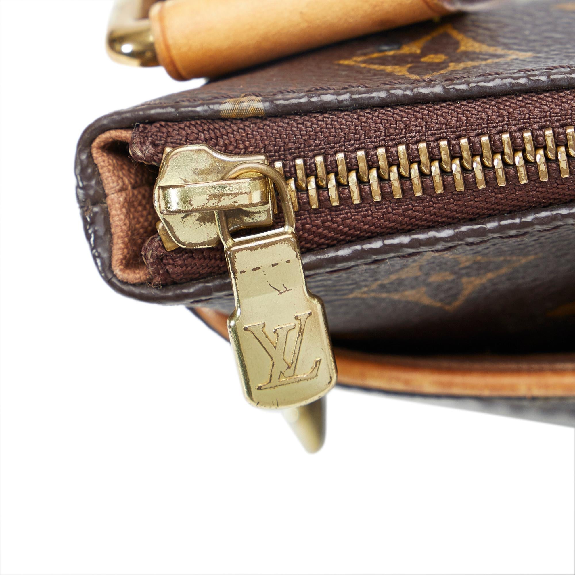 Louis Vuitton Monogram Pochette Valmy (SHG-NC9xDn)