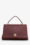 Chanel™ Burgundy Grained Calfskin Stitched Chevron Medium Chic Top Handle