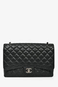 Chanel™ 2010/11 Black Caviar Leather Maxi Double Flap