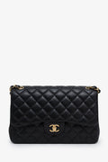 Chanel™ 2019 Black Lambskin Jumbo Double Flap Bag GHW