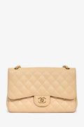Chanel™ 2011 Beige Caviar Leather Jumbo Double Flap Bag