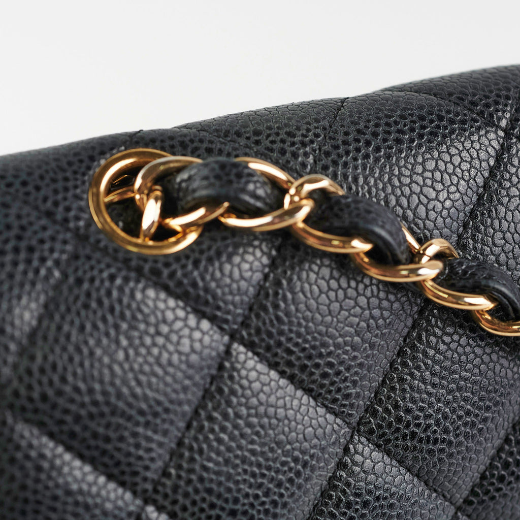 Chanel Maxi Jumbo Double Flap Black Caviar