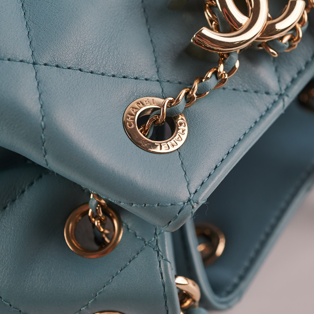 ITEM 16 - Chanel Drawstring Bucket Bag Light Blue