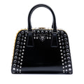 Prada Small Studded Saffiano Vernice Frame Top Handle Bag