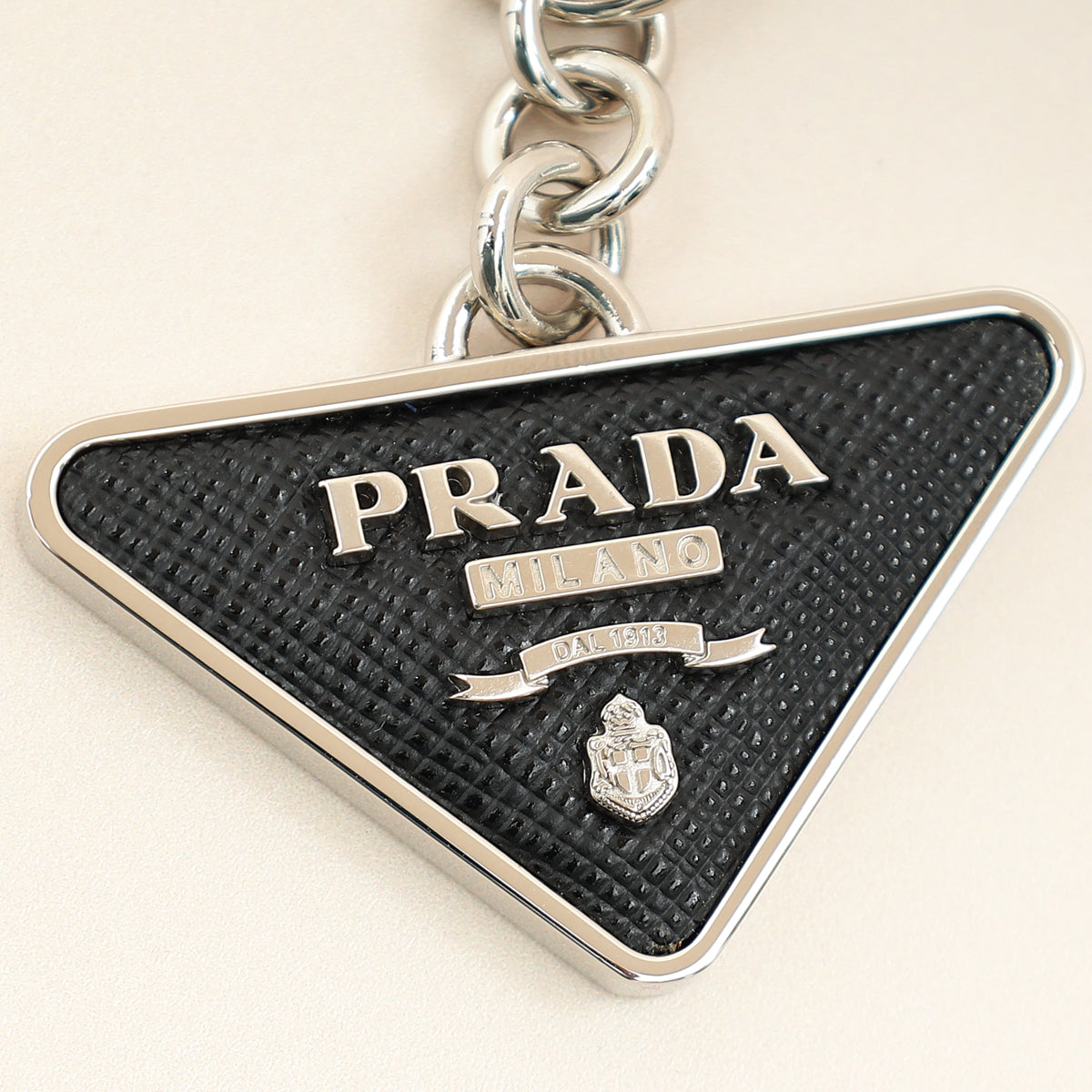Prada Black Triangle Logo Metal Keychain