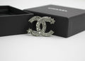 Chanel C21S Rhinestone Metal Silver Star Twist Brooch