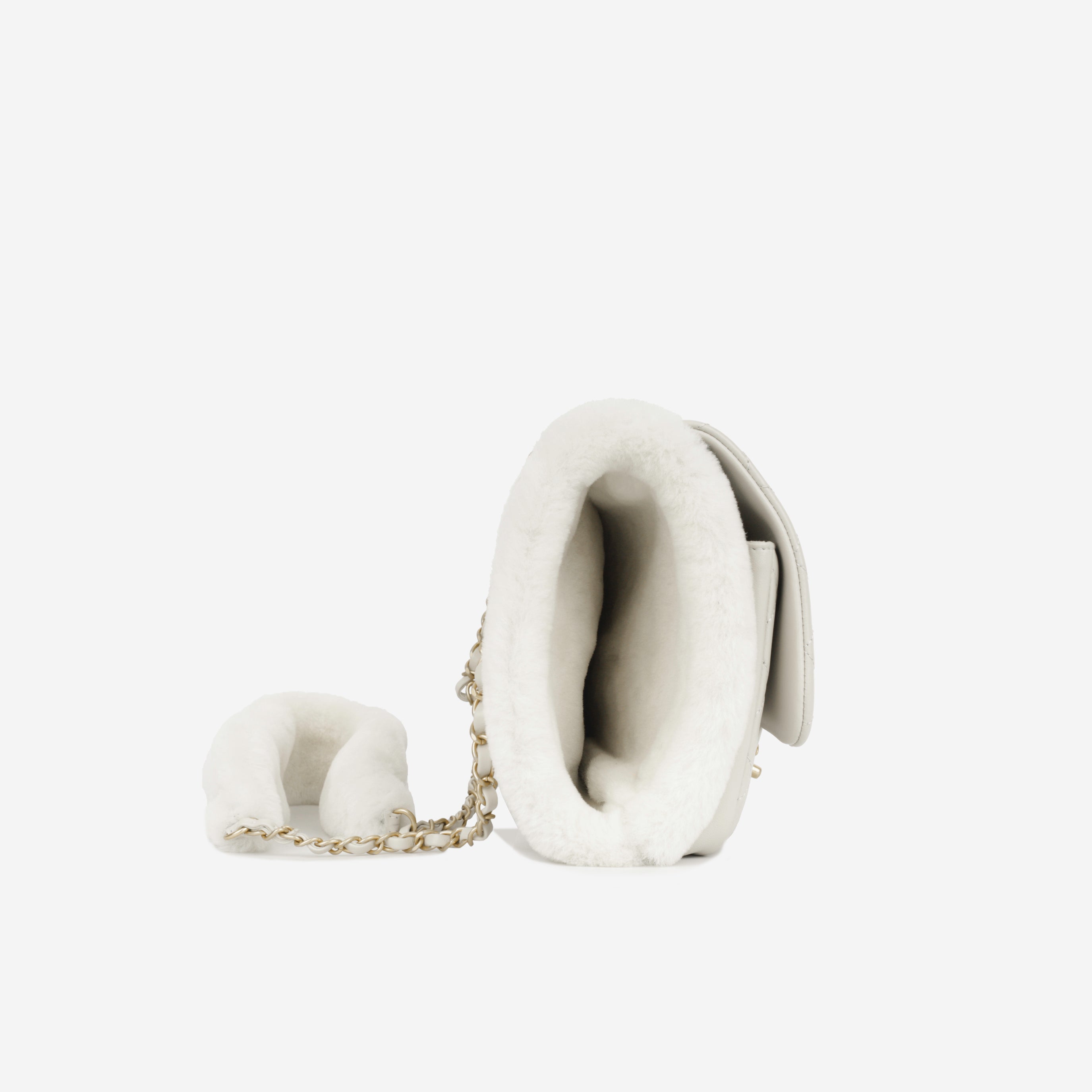 Chanel Muff Shearling Flap