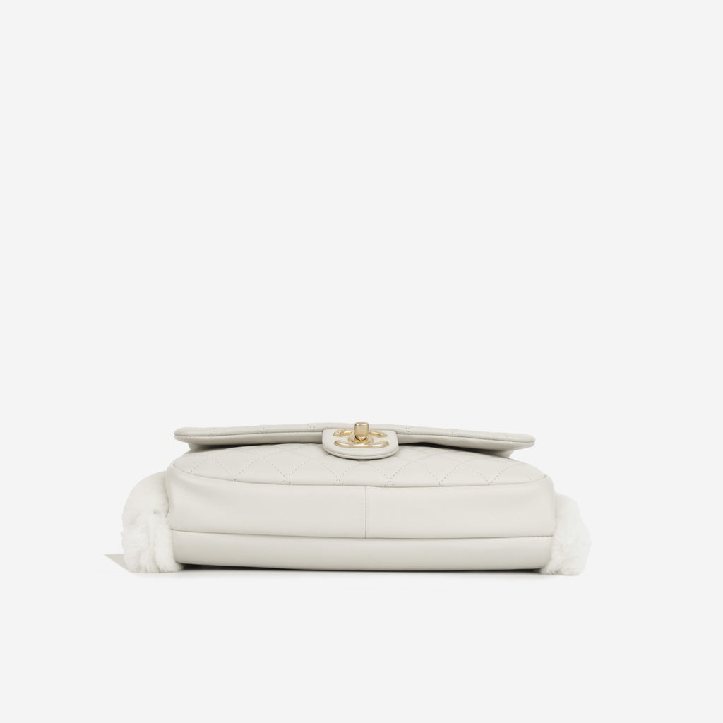 Chanel Muff Shearling Flap