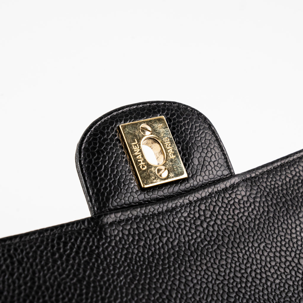 ITEM 17 - Chanel Vintage Classic Medium/Large Black Caviar 24K Gold