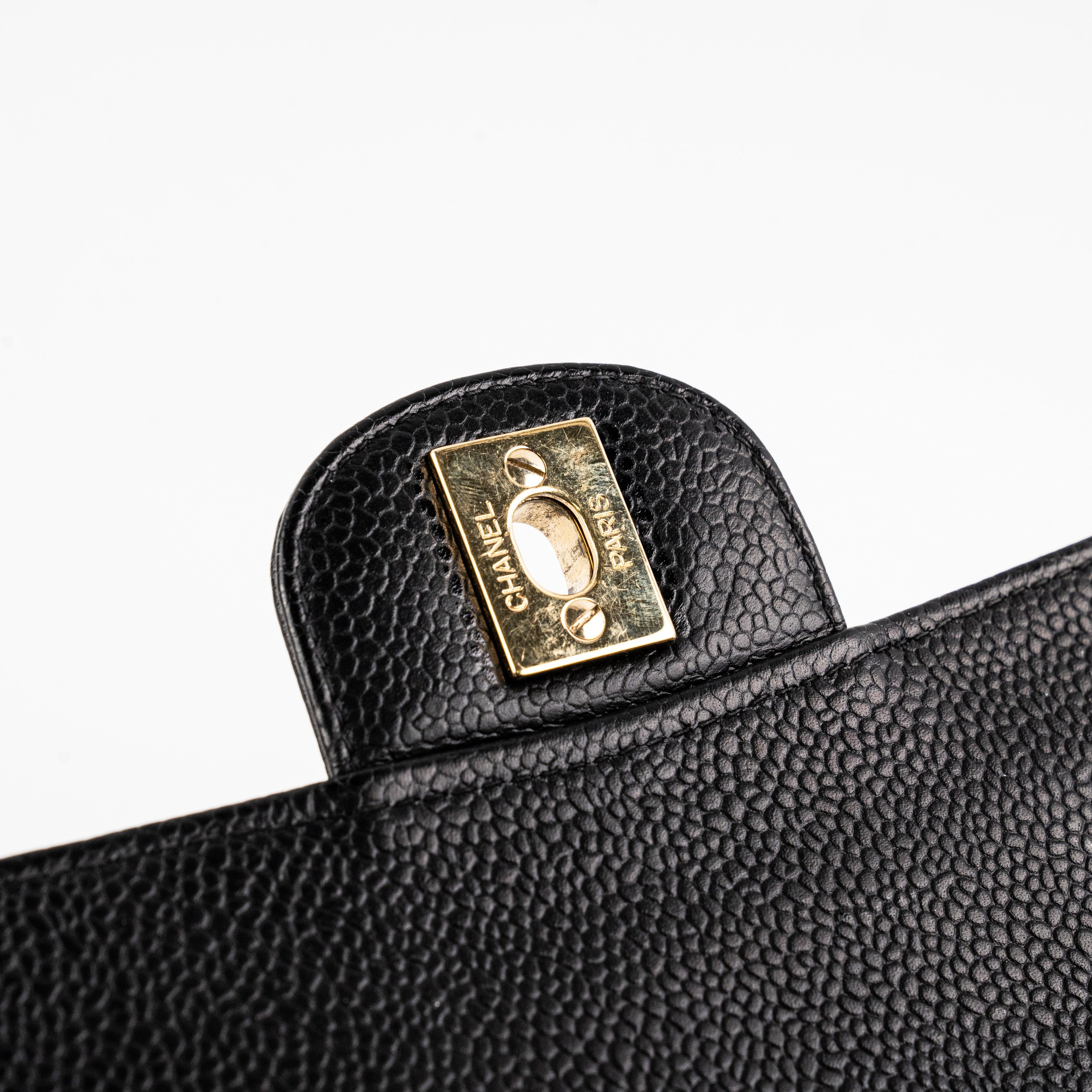 ITEM 17 - Chanel Vintage Classic Medium/Large Black Caviar 24K Gold