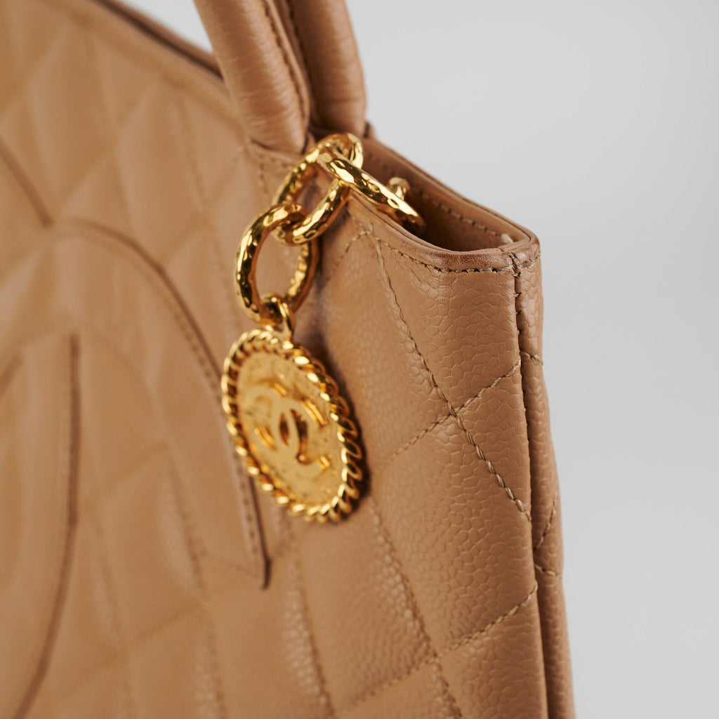 ITEM 28 - Chanel Medallion Beige Caviar
