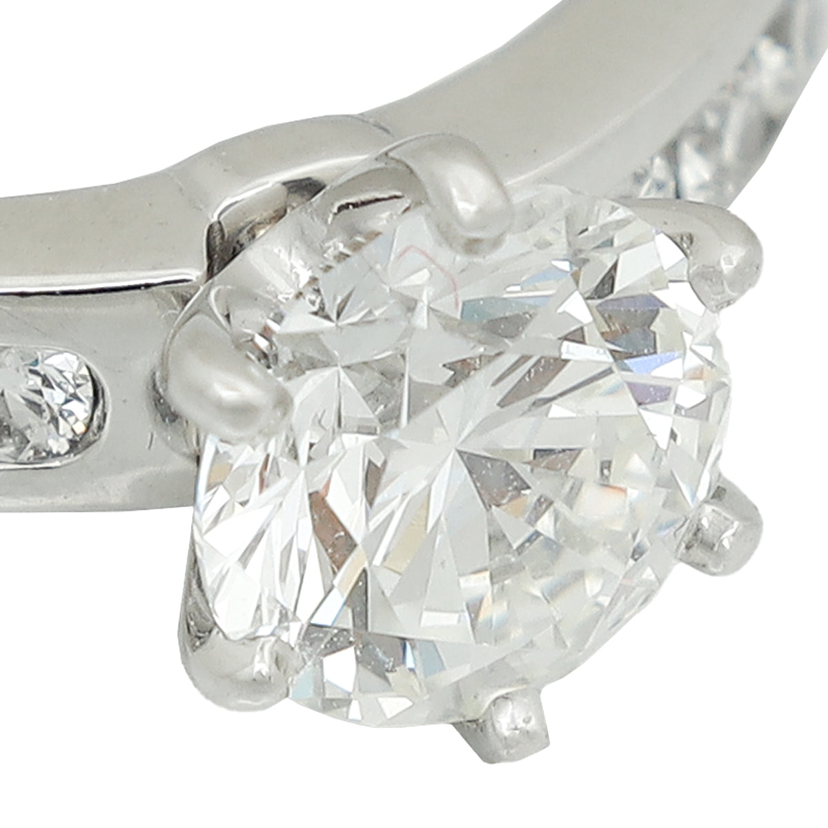 Tiffany & Co, Platinum Setting Engagement Ring with a Channel-set Diamond Band