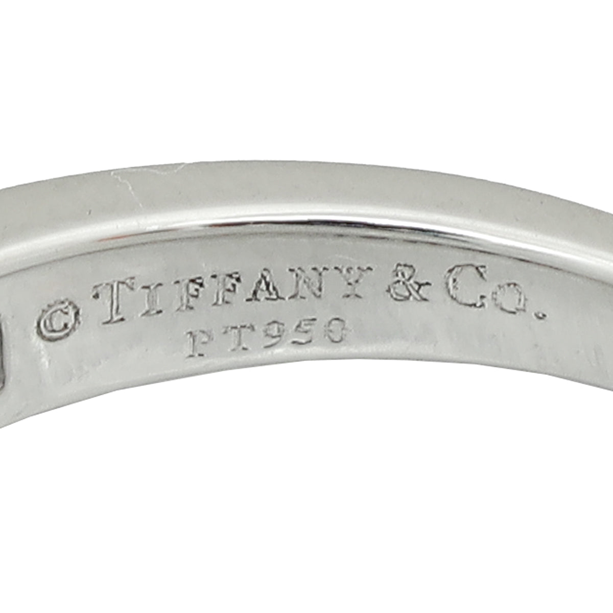 Tiffany & Co, Platinum Setting Engagement Ring with a Channel-set Diamond Band