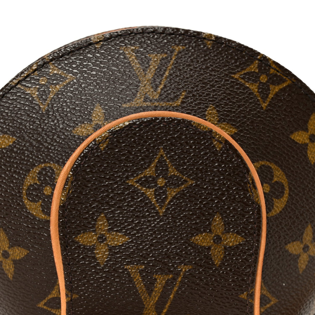 Monogram Mini Ellipse Wristlet Clutch