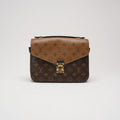 Louis Vuitton Pochette Métis Monogram Reverse Canvas 2018