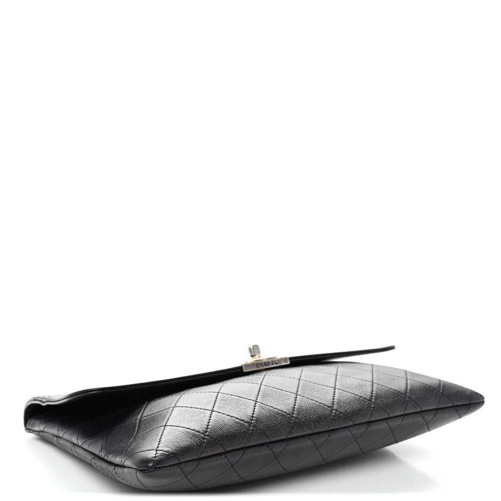Lambskin Quilted Sleek And Chic Clutch Black