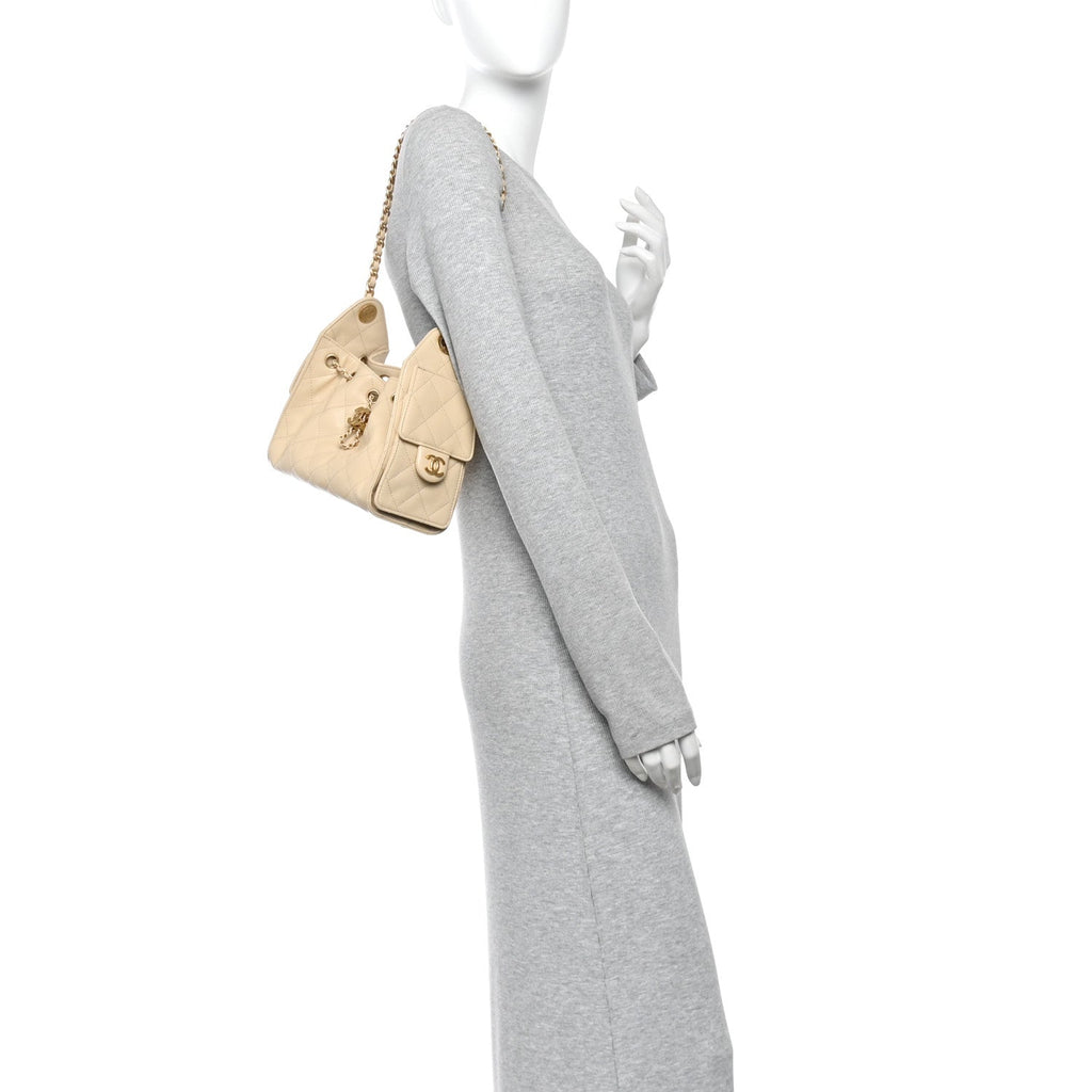 Caviar Quilted Mini Chanel 25 Handbag Beige