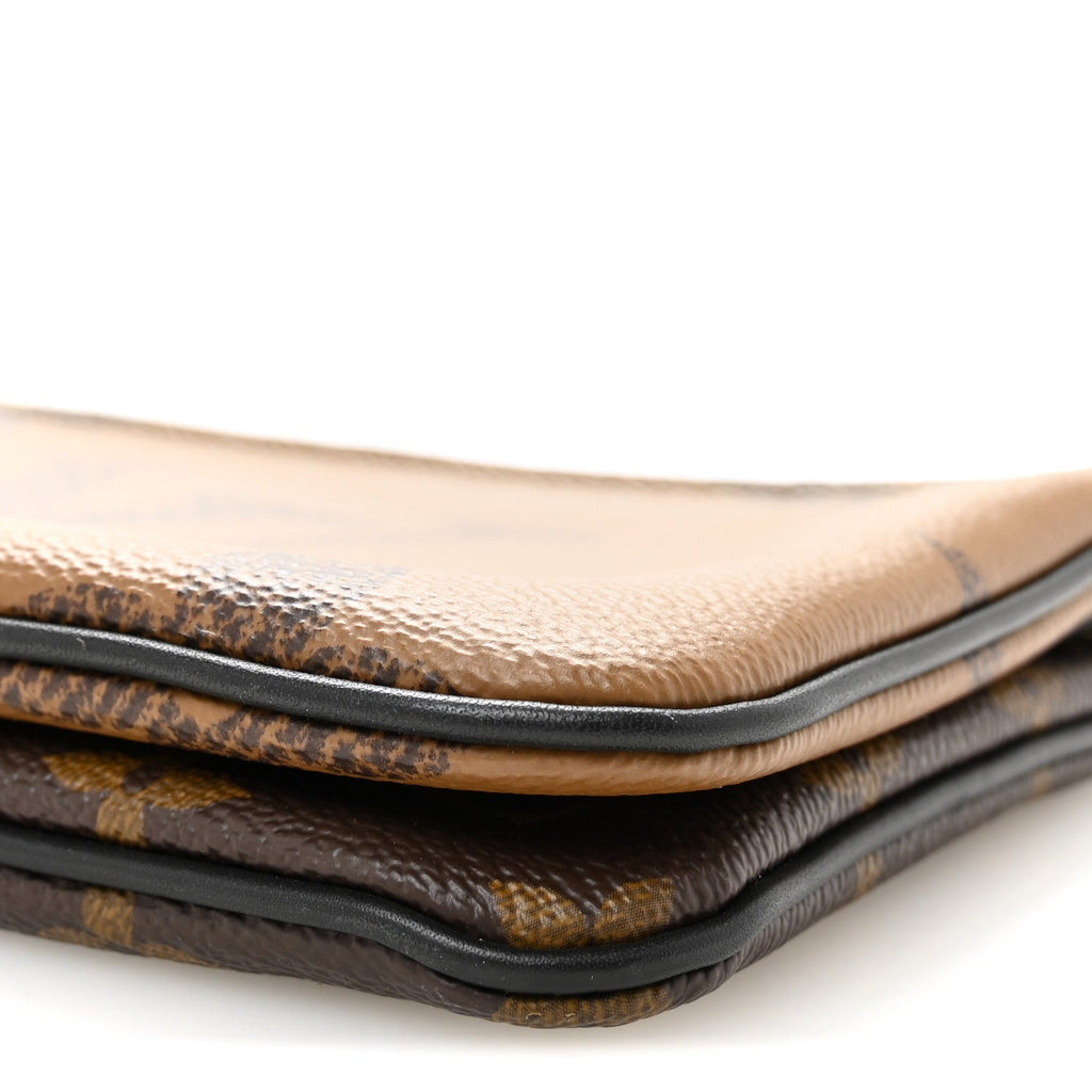 Reverse Monogram Giant Double Zip Pochette