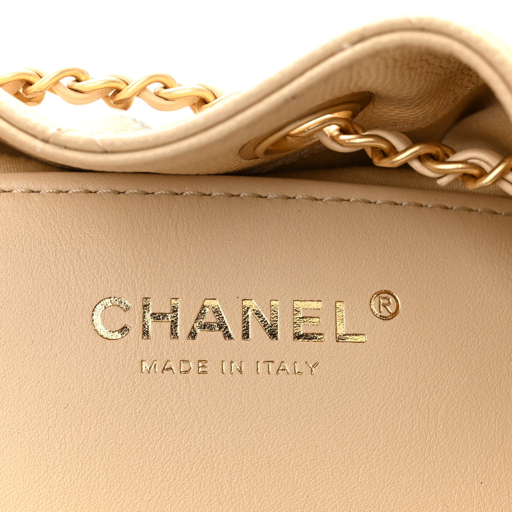 Caviar Quilted Mini Chanel 25 Handbag Beige