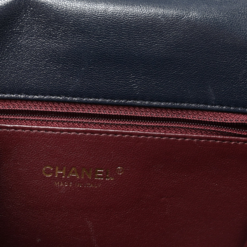 Shiny Sheepskin Chevron Quilted Collar and Tie Flap Navy