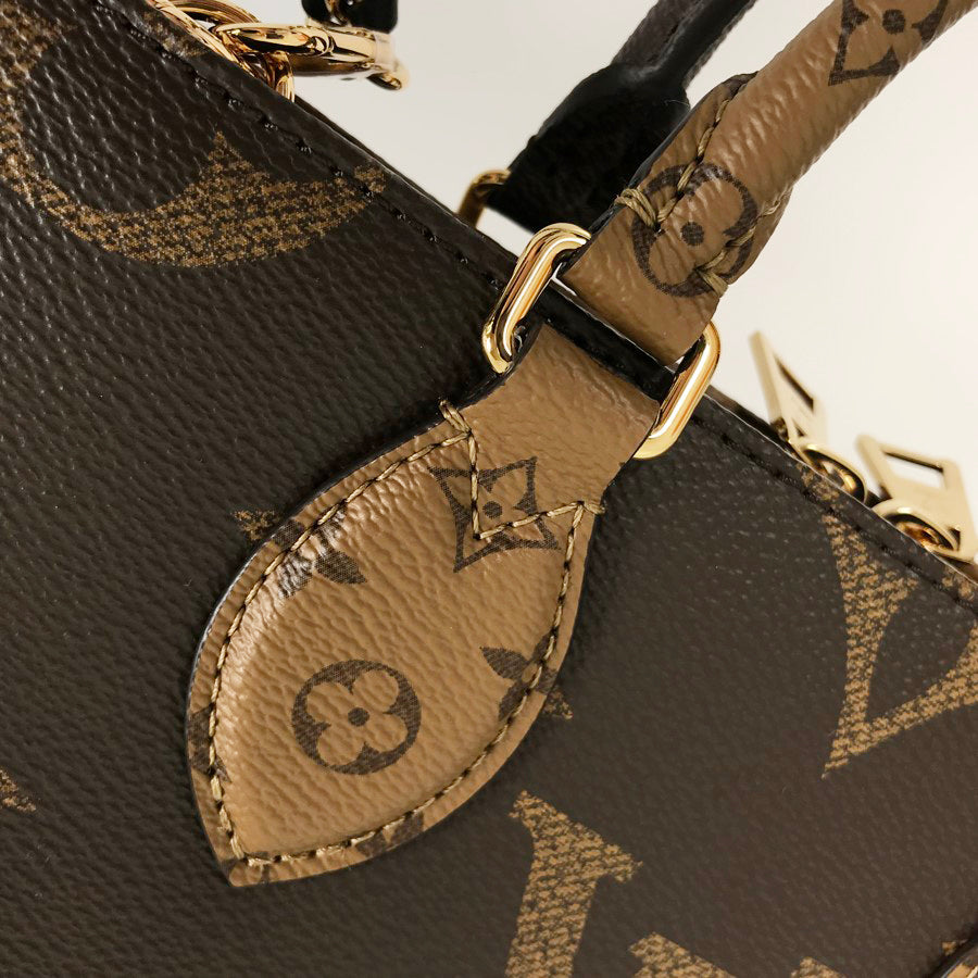 LOUIS VUITTON Monogram Giant Reverse On the Go EW Chain M14236 Hand bag