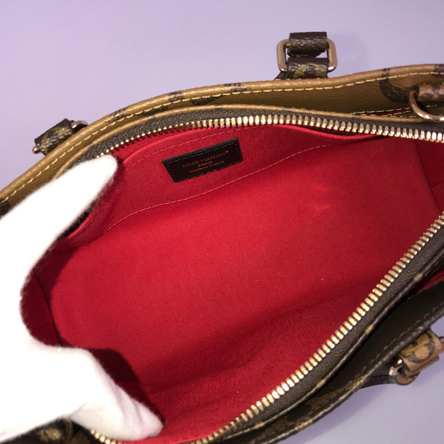 LOUIS VUITTON Monogram Giant Reverse On the Go EW Chain M14236 Hand bag