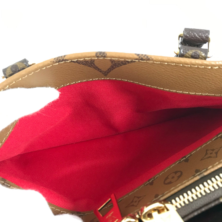 LOUIS VUITTON Monogram Giant Reverse On the Go EW Chain M14236 Hand bag