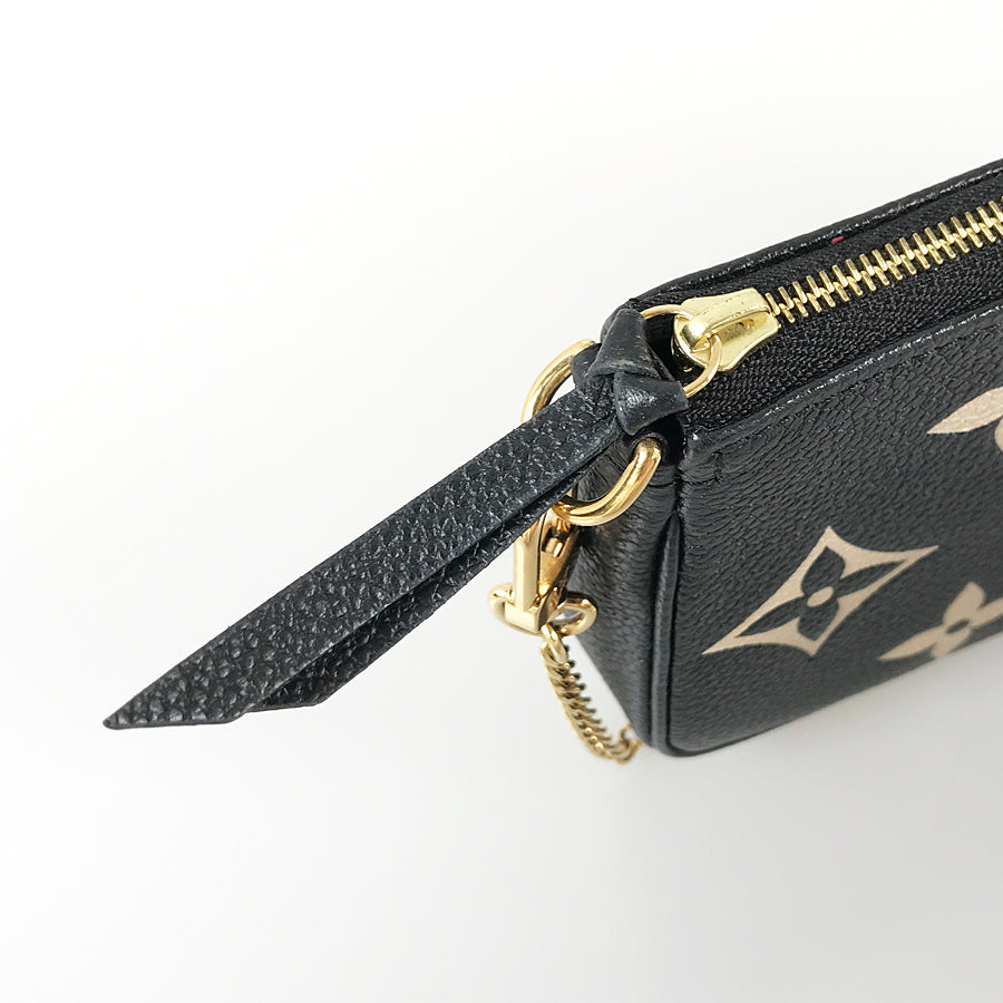 LOUIS VUITTON Monogram Empreinte Mini Pochette Accessoires M80732 Pouch