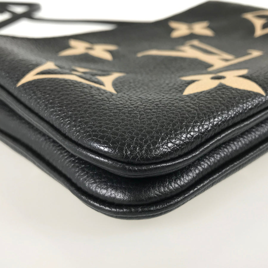 LOUIS VUITTON Monogram Empreinte Bicolor Pochette Double Zip M80787 Shoulder bag