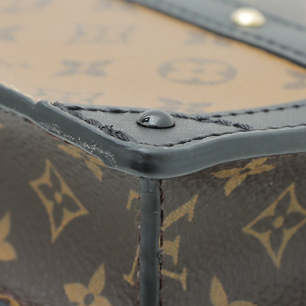 Louis Vuitton Monogram Reverse Trunk Clutch Bag