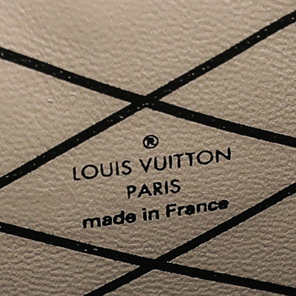 Louis Vuitton Monogram Reverse Trunk Clutch Bag
