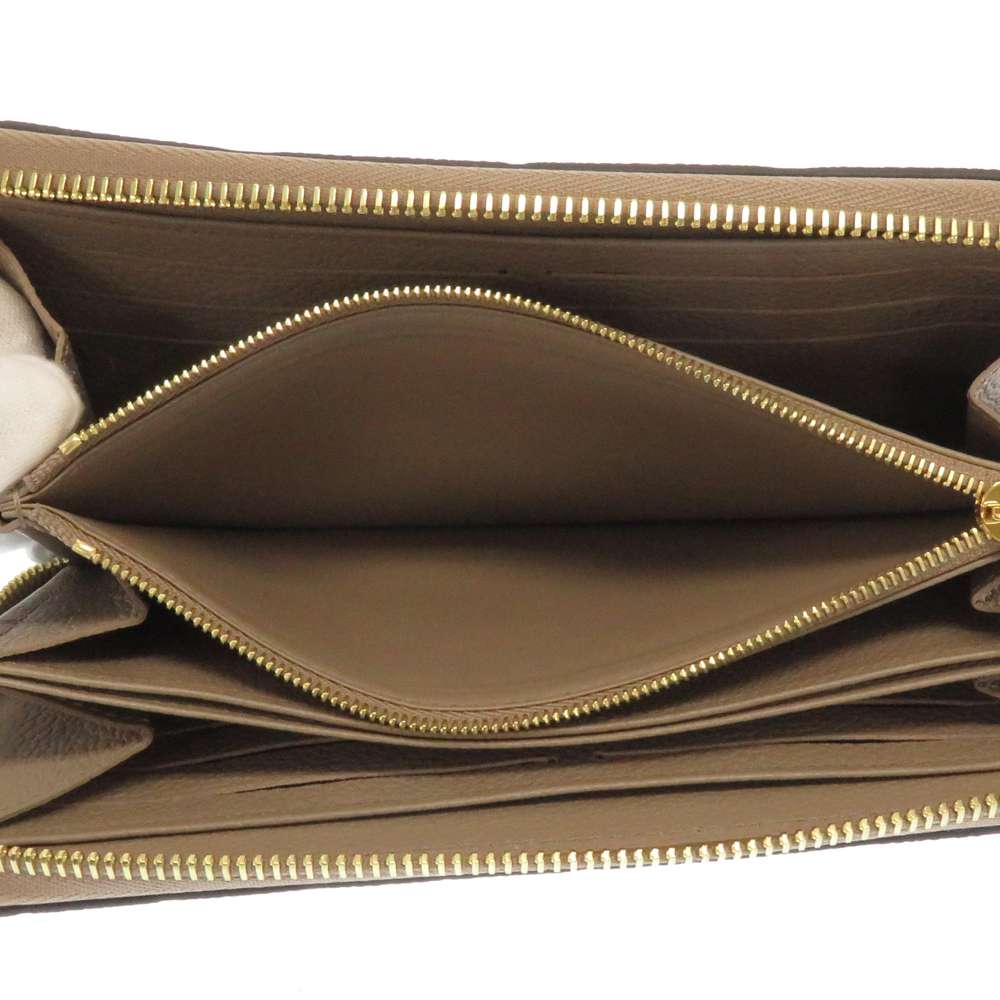 LOUIS VUITTON Zippy Wallet TourterelleM69034 Monogram Empreinte Leather