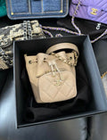 CHANEL 22B MINI BUCKET BAG WITH CHAIN