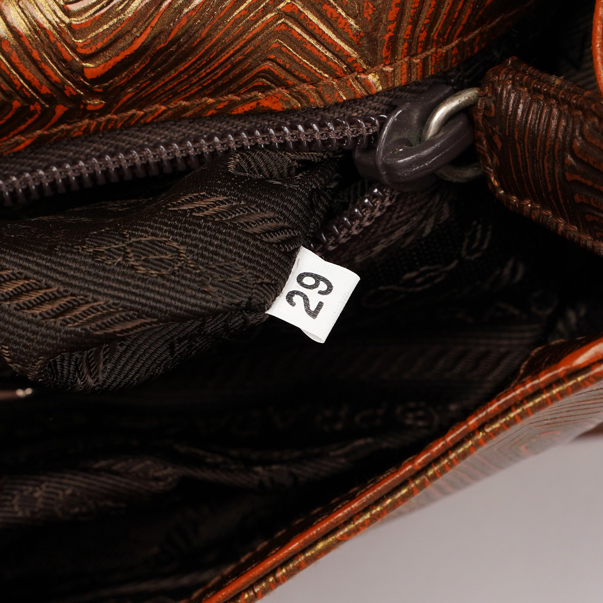 Bronze Tartaruga Patent Shoulder Bag
